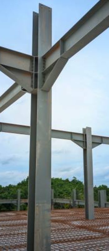 photo of steel building columns with wire mesh floors