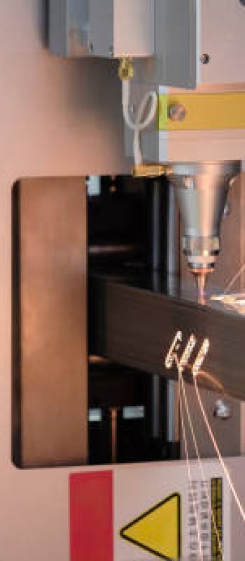 Close up scene the fiber laser cutting machine cutting  machine. cut the stainless steel tube. The hi-technology sheet metal manufacturing process by laser cutting machine. technical concept background